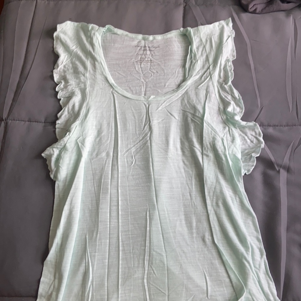 light green/blue shirt